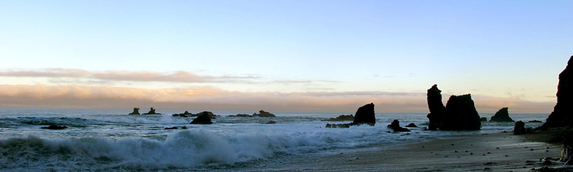 Take an evening stroll along Moeraki's incredible wilderness coastline on the West Coast of New Zealand's South Island.