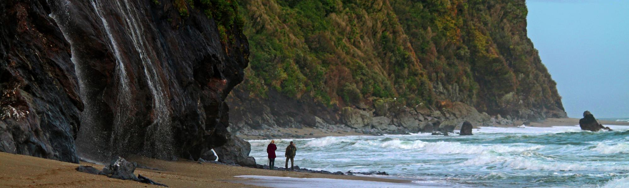 Walk the wild and dramatic Moeraki Coastline in New Zealand's South Island.